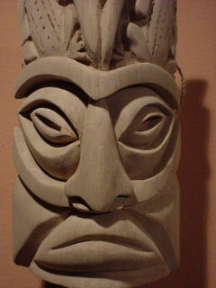 Carved balsa wood human face mask by Boruca Indians, located in Buenos Aires, Costa Rica - traditional boruca masks are not painted