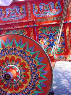 Close up of intricately painted red ox cart at the factory in Sarchi, Costa Rica